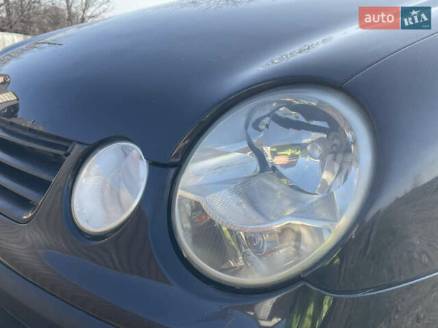 Чорний Фольксваген Поло, об'ємом двигуна 1.2 л та пробігом 242 тис. км за 2999 $, фото 5 на Automoto.ua