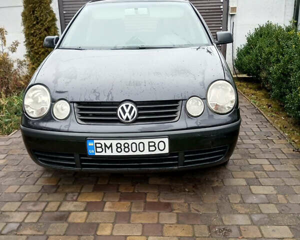 Черный Фольксваген Поло, объемом двигателя 1.4 л и пробегом 245 тыс. км за 4100 $, фото 3 на Automoto.ua