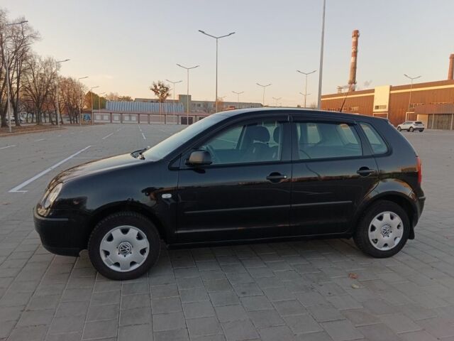 Черный Фольксваген Поло, объемом двигателя 1.4 л и пробегом 183 тыс. км за 4200 $, фото 3 на Automoto.ua