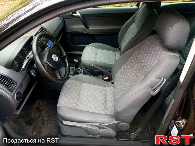 Чорний Фольксваген Поло, об'ємом двигуна 1.2 л та пробігом 200 тис. км за 4600 $, фото 7 на Automoto.ua