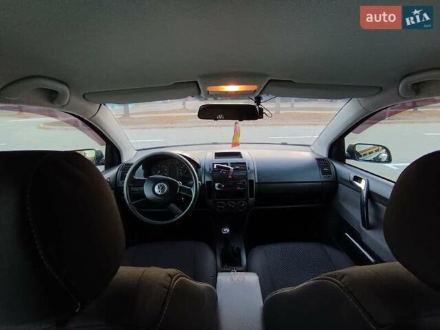 Чорний Фольксваген Поло, об'ємом двигуна 1.39 л та пробігом 178 тис. км за 4200 $, фото 24 на Automoto.ua