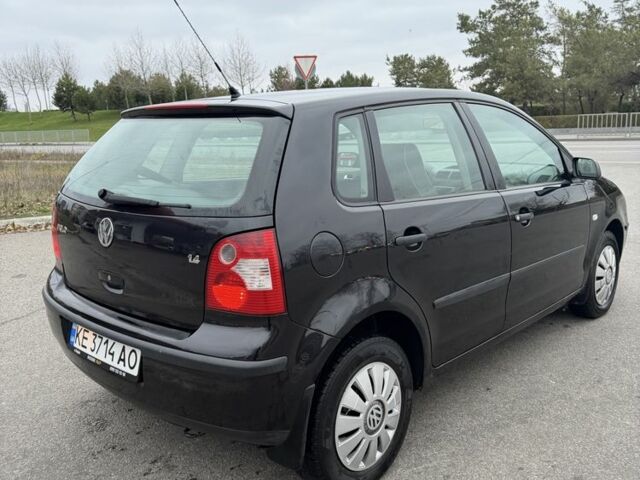 Черный Фольксваген Поло, объемом двигателя 1.4 л и пробегом 221 тыс. км за 3650 $, фото 2 на Automoto.ua