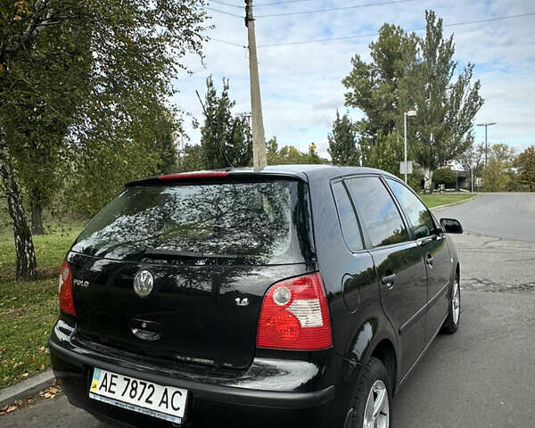 Черный Фольксваген Поло, объемом двигателя 1.4 л и пробегом 190 тыс. км за 5200 $, фото 6 на Automoto.ua