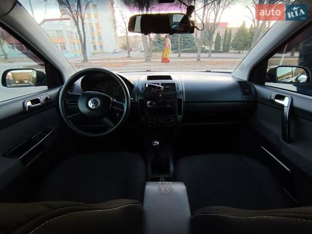 Чорний Фольксваген Поло, об'ємом двигуна 1.39 л та пробігом 178 тис. км за 4200 $, фото 26 на Automoto.ua