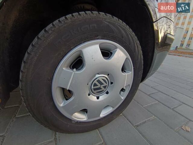 Чорний Фольксваген Поло, об'ємом двигуна 1.39 л та пробігом 178 тис. км за 4200 $, фото 33 на Automoto.ua