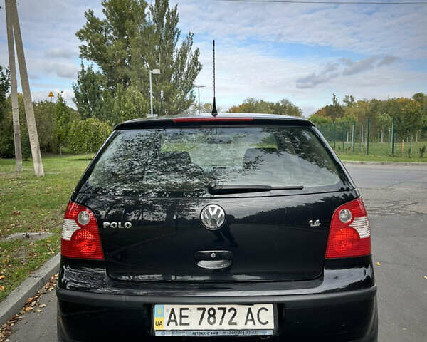 Черный Фольксваген Поло, объемом двигателя 1.4 л и пробегом 190 тыс. км за 5200 $, фото 8 на Automoto.ua