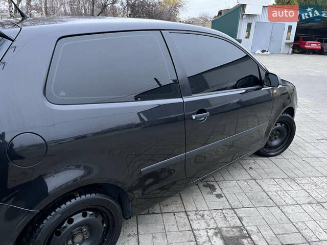 Черный Фольксваген Поло, объемом двигателя 1.2 л и пробегом 217 тыс. км за 3500 $, фото 7 на Automoto.ua