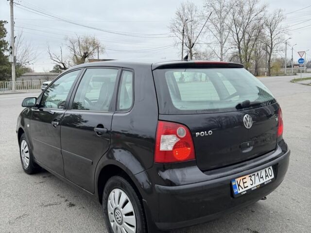 Черный Фольксваген Поло, объемом двигателя 1.4 л и пробегом 221 тыс. км за 3650 $, фото 4 на Automoto.ua
