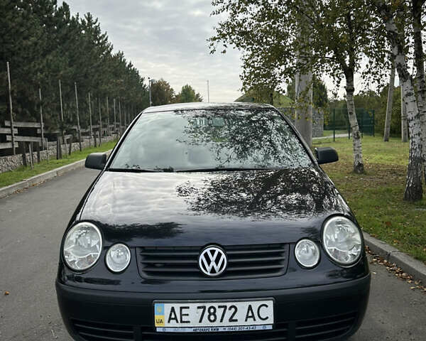 Черный Фольксваген Поло, объемом двигателя 1.4 л и пробегом 190 тыс. км за 5200 $, фото 2 на Automoto.ua