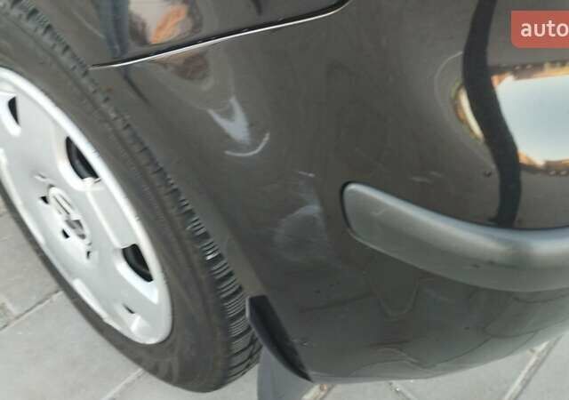 Чорний Фольксваген Поло, об'ємом двигуна 1.39 л та пробігом 178 тис. км за 4200 $, фото 40 на Automoto.ua