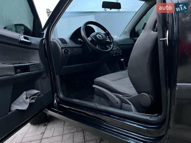 Черный Фольксваген Поло, объемом двигателя 1.2 л и пробегом 217 тыс. км за 3500 $, фото 3 на Automoto.ua