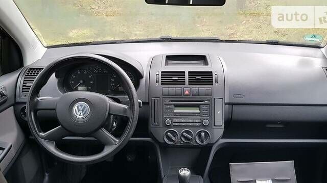 Чорний Фольксваген Поло, об'ємом двигуна 1.2 л та пробігом 205 тис. км за 4800 $, фото 17 на Automoto.ua