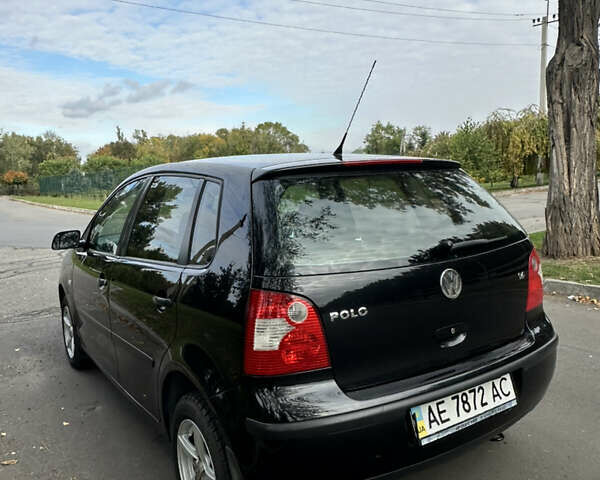 Черный Фольксваген Поло, объемом двигателя 1.4 л и пробегом 190 тыс. км за 5200 $, фото 9 на Automoto.ua