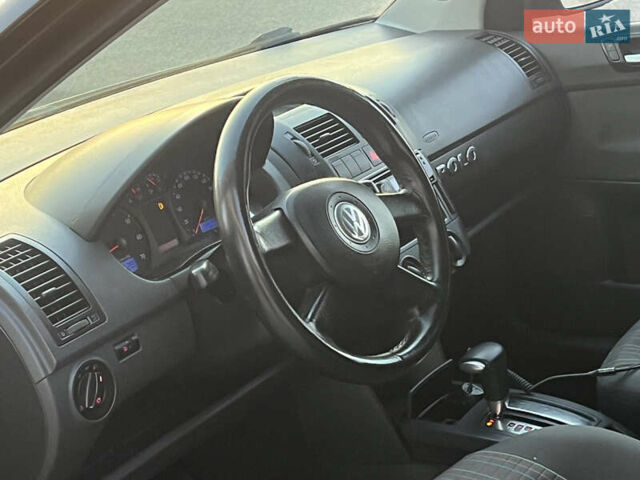 Черный Фольксваген Поло, объемом двигателя 1.4 л и пробегом 159 тыс. км за 4599 $, фото 21 на Automoto.ua