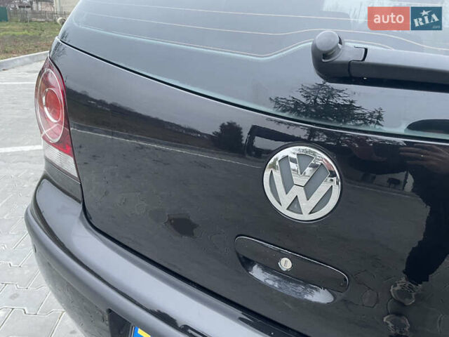 Черный Фольксваген Поло, объемом двигателя 1.39 л и пробегом 232 тыс. км за 5250 $, фото 11 на Automoto.ua