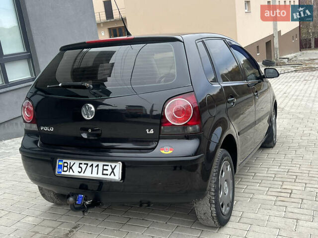 Чорний Фольксваген Поло, об'ємом двигуна 1.4 л та пробігом 159 тис. км за 4599 $, фото 7 на Automoto.ua