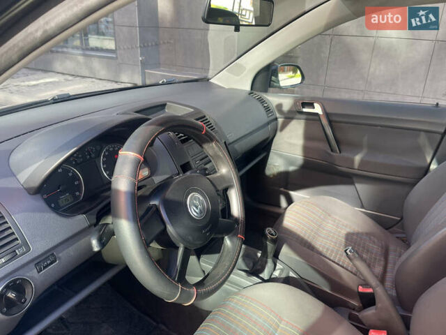 Черный Фольксваген Поло, объемом двигателя 1.4 л и пробегом 158 тыс. км за 4999 $, фото 10 на Automoto.ua