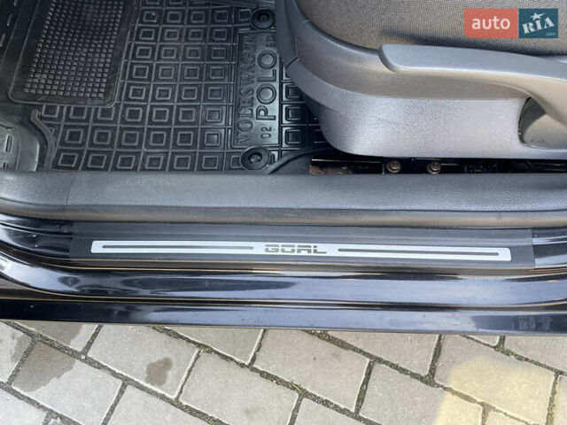 Черный Фольксваген Поло, объемом двигателя 1.39 л и пробегом 240 тыс. км за 4400 $, фото 24 на Automoto.ua