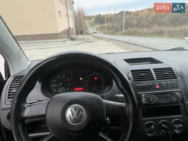 Чорний Фольксваген Поло, об'ємом двигуна 1.4 л та пробігом 159 тис. км за 4599 $, фото 29 на Automoto.ua