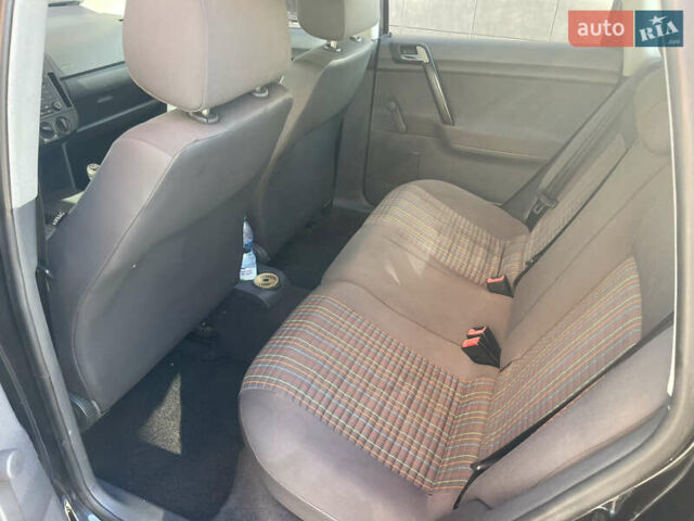 Черный Фольксваген Поло, объемом двигателя 1.4 л и пробегом 158 тыс. км за 4999 $, фото 12 на Automoto.ua