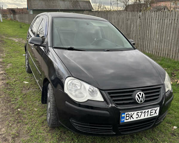 Чорний Фольксваген Поло, об'ємом двигуна 1.39 л та пробігом 160 тис. км за 4950 $, фото 20 на Automoto.ua