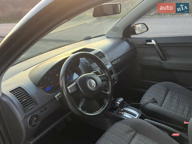Черный Фольксваген Поло, объемом двигателя 1.4 л и пробегом 159 тыс. км за 4599 $, фото 24 на Automoto.ua