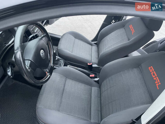 Черный Фольксваген Поло, объемом двигателя 1.39 л и пробегом 232 тыс. км за 5250 $, фото 24 на Automoto.ua