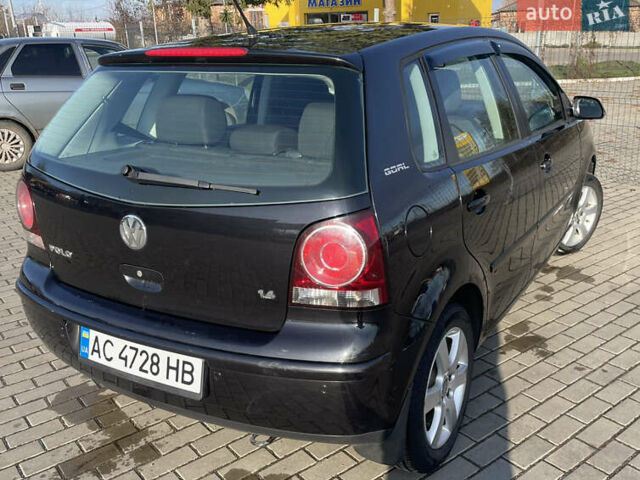 Черный Фольксваген Поло, объемом двигателя 1.39 л и пробегом 240 тыс. км за 4400 $, фото 6 на Automoto.ua