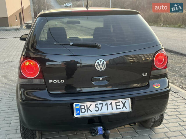Черный Фольксваген Поло, объемом двигателя 1.4 л и пробегом 159 тыс. км за 4599 $, фото 10 на Automoto.ua