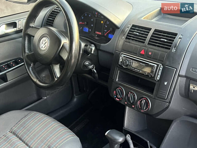 Черный Фольксваген Поло, объемом двигателя 1.4 л и пробегом 159 тыс. км за 4599 $, фото 36 на Automoto.ua