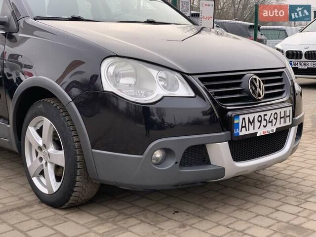 Черный Фольксваген Поло, объемом двигателя 1.4 л и пробегом 153 тыс. км за 6255 $, фото 7 на Automoto.ua