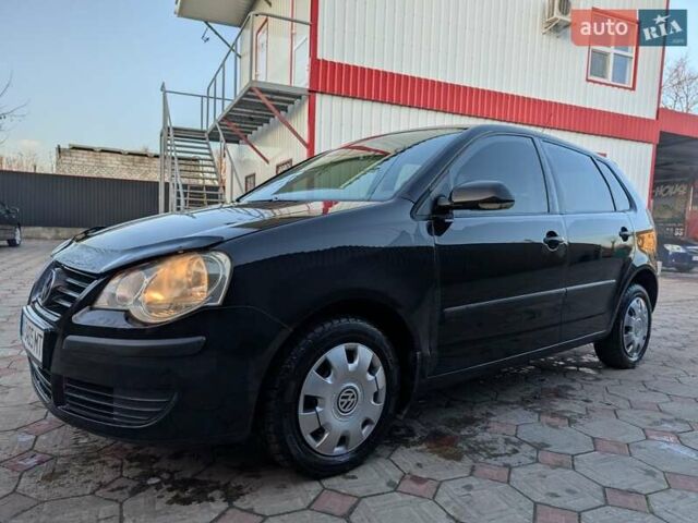 Чорний Фольксваген Поло, об'ємом двигуна 1.39 л та пробігом 250 тис. км за 5200 $, фото 1 на Automoto.ua
