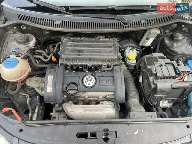 Черный Фольксваген Поло, объемом двигателя 1.4 л и пробегом 114 тыс. км за 6499 $, фото 27 на Automoto.ua