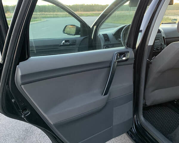 Черный Фольксваген Поло, объемом двигателя 1.4 л и пробегом 190 тыс. км за 6999 $, фото 41 на Automoto.ua