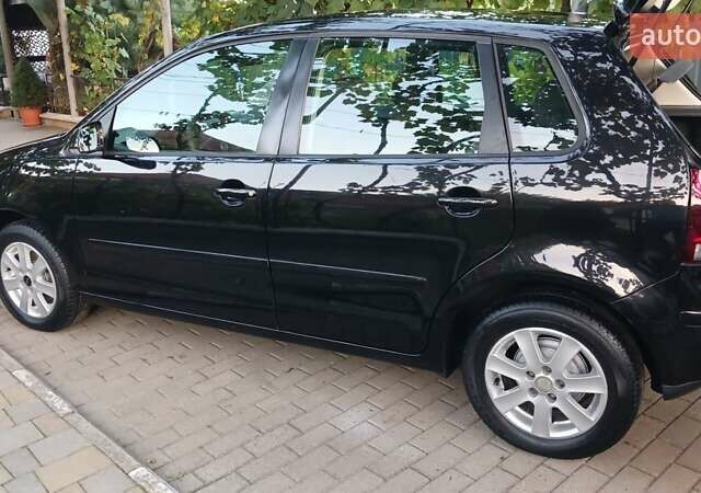 Черный Фольксваген Поло, объемом двигателя 1.4 л и пробегом 211 тыс. км за 4700 $, фото 27 на Automoto.ua