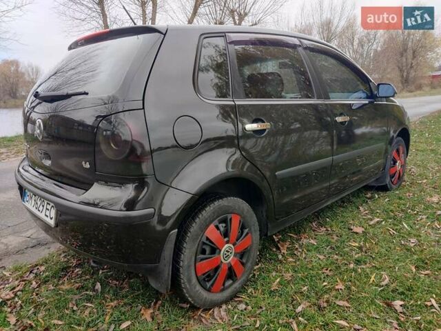 Черный Фольксваген Поло, объемом двигателя 1.4 л и пробегом 170 тыс. км за 5900 $, фото 6 на Automoto.ua