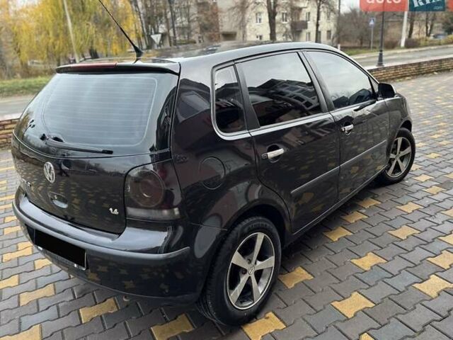 Черный Фольксваген Поло, объемом двигателя 1.4 л и пробегом 212 тыс. км за 4500 $, фото 6 на Automoto.ua