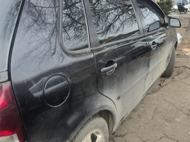 Чорний Фольксваген Поло, об'ємом двигуна 1.4 л та пробігом 247 тис. км за 5000 $, фото 2 на Automoto.ua