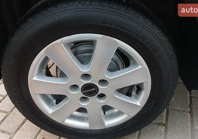 Черный Фольксваген Поло, объемом двигателя 1.4 л и пробегом 211 тыс. км за 4700 $, фото 12 на Automoto.ua