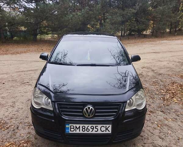 Черный Фольксваген Поло, объемом двигателя 1.4 л и пробегом 275 тыс. км за 4600 $, фото 7 на Automoto.ua