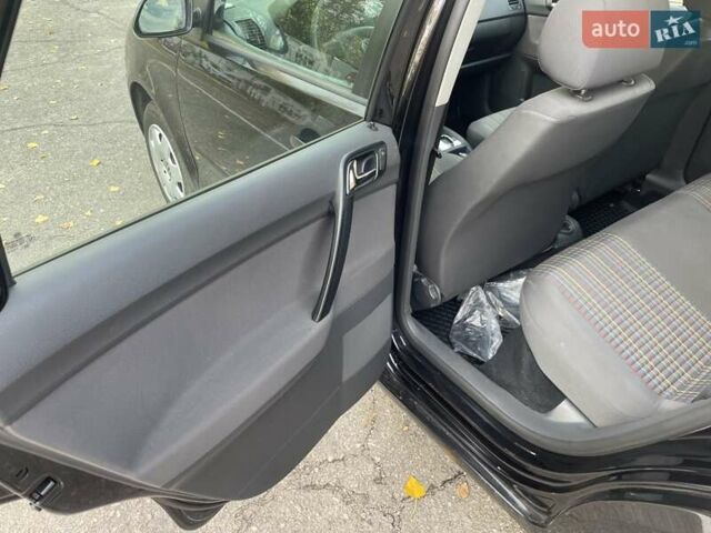 Черный Фольксваген Поло, объемом двигателя 1.4 л и пробегом 114 тыс. км за 6499 $, фото 15 на Automoto.ua