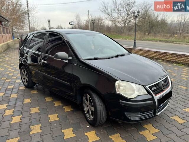 Черный Фольксваген Поло, объемом двигателя 1.4 л и пробегом 212 тыс. км за 4500 $, фото 2 на Automoto.ua