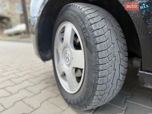 Чорний Фольксваген Поло, об'ємом двигуна 1.4 л та пробігом 327 тис. км за 3450 $, фото 23 на Automoto.ua