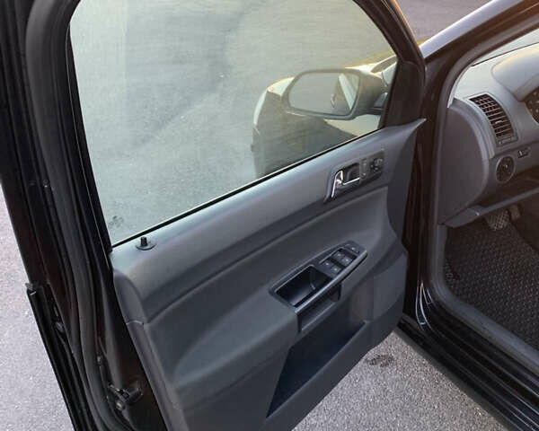 Черный Фольксваген Поло, объемом двигателя 1.4 л и пробегом 190 тыс. км за 6999 $, фото 42 на Automoto.ua