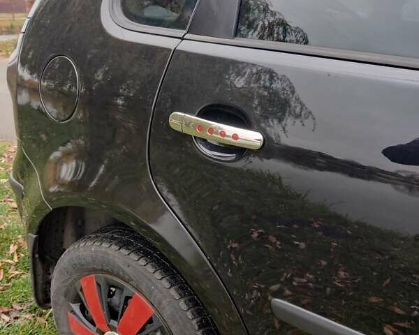 Черный Фольксваген Поло, объемом двигателя 1.4 л и пробегом 170 тыс. км за 5900 $, фото 8 на Automoto.ua