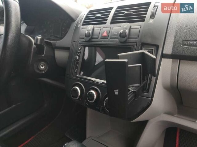 Черный Фольксваген Поло, объемом двигателя 1.4 л и пробегом 170 тыс. км за 5900 $, фото 18 на Automoto.ua