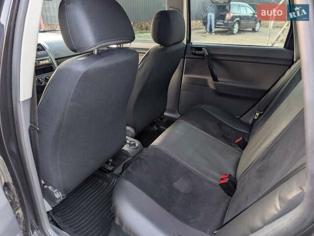 Чорний Фольксваген Поло, об'ємом двигуна 1.39 л та пробігом 250 тис. км за 5200 $, фото 5 на Automoto.ua