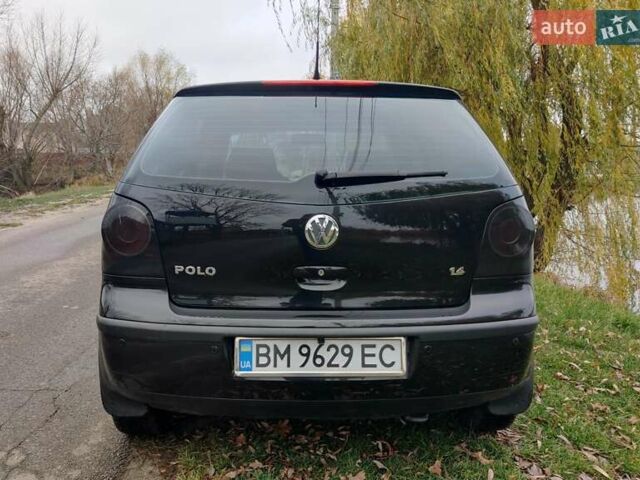 Черный Фольксваген Поло, объемом двигателя 1.4 л и пробегом 170 тыс. км за 5900 $, фото 5 на Automoto.ua