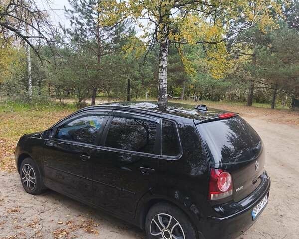 Черный Фольксваген Поло, объемом двигателя 1.4 л и пробегом 275 тыс. км за 4600 $, фото 6 на Automoto.ua