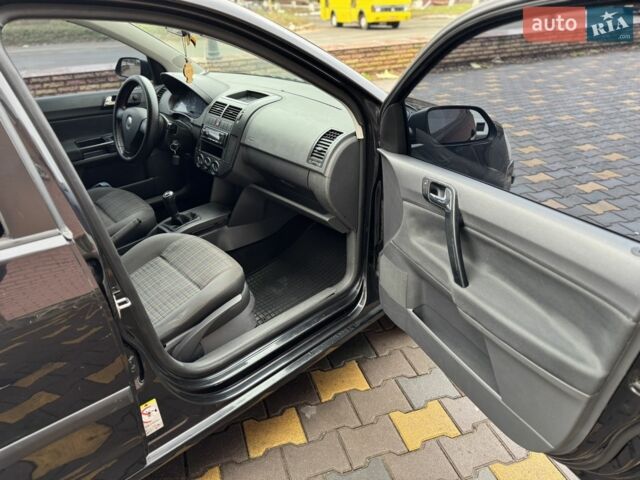 Черный Фольксваген Поло, объемом двигателя 1.4 л и пробегом 212 тыс. км за 4500 $, фото 16 на Automoto.ua